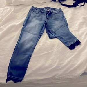 WHBM jeans with black lace ankle detail